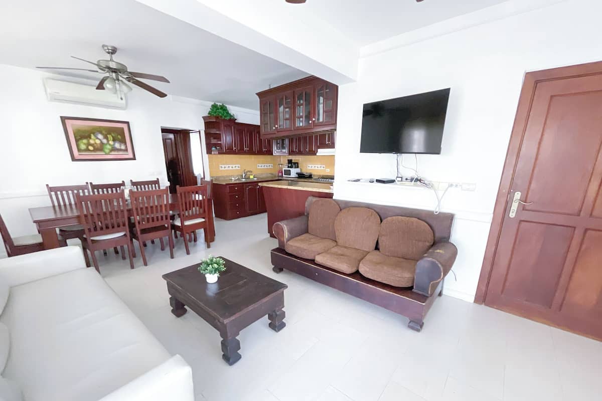Exclusive Apartment, Balcony | Living area