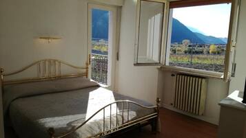 Family Room, Balcony, Mountain View | Free WiFi, bed sheets