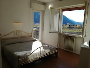Family Room, Balcony, Mountain View | Free WiFi, bed sheets