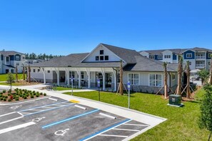 Exterior - Wildlight Retreat Pool · Pickleball · Canopy Bed (Yulee)