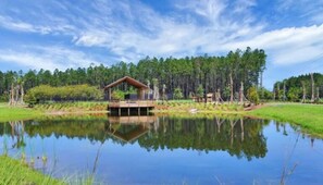 Property grounds - Wildlight Retreat Pool · Pickleball · Canopy Bed (Yulee)