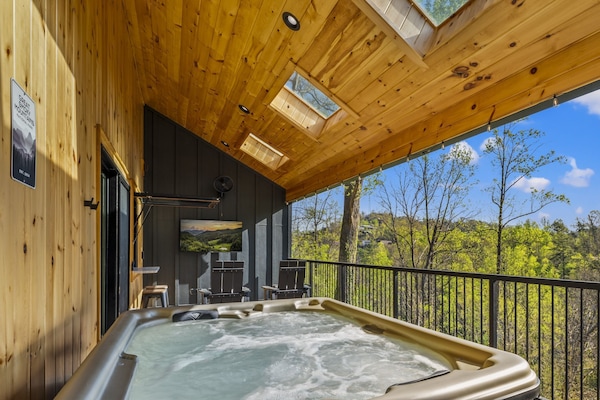 Bañera de hidromasaje al aire libre