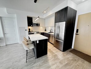 Fridge, microwave, oven, stovetop - Lakeside 2 BR New Condo at Friday Harbour | 1hr from GTA (Innisfil)