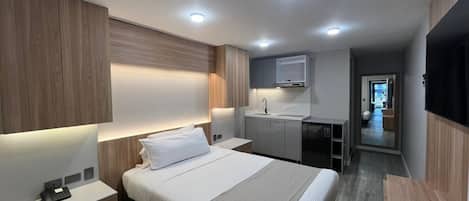1 habitación, tabla de planchar con plancha, wifi gratis y ropa de cama