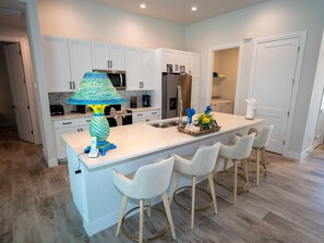 Fridge, microwave, oven, stovetop - Villa Sunrise Breeze: Spacious Waterfront Retreat with Heated Pool (Cape Coral)