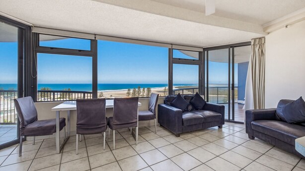 A balcony with a view of the beach and ocean. - Centrepoint Unit 58, 30 Minchinton Street, Calound (Caloundra)