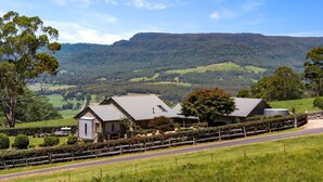 A rural property with a farmhouse, a fenced yard, and a road. - Newhaven - Kangaroo Valley (Upper Kangaroo River)