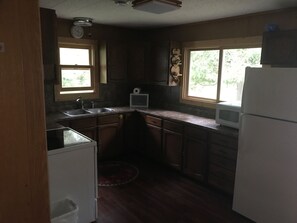 Private kitchen - Cozy 3 bedroom cabin centrally located at Moccasin Point, Lake Vermilion. (Tower)