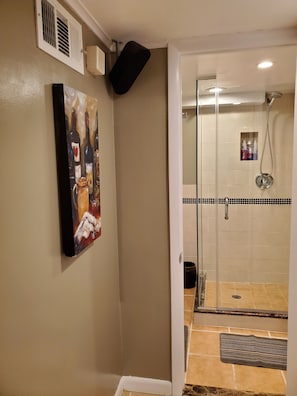 Shower, hair dryer, towels, soap