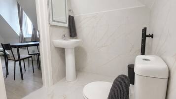 Hair dryer, towels, soap, toilet paper
