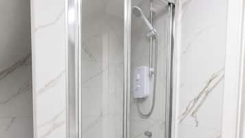 Hair dryer, towels, soap, toilet paper