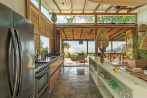 Private kitchen - VILLA POMPADOUR: EXCLUSIVE BOHO CHIC WITH PANORAMIC OCEAN AND JUNGLE VIEWS (Santa Teresa)