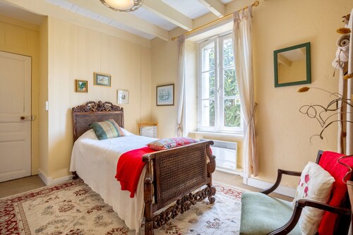Chambre d’hôtes « Chambre Verte » avec jardin partagé et Wi-Fi