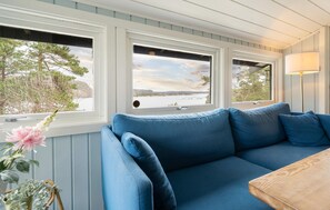 TV, fireplace - Nice home in Risør with house sea view (Risør)