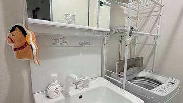 Hair dryer, towels, soap, toilet paper