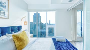 Elite Suite, 2 Bedrooms, Non Smoking, City View | Individually decorated, individually furnished, blackout curtains