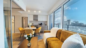 Standard Suite, 1 Bedroom, Non Smoking, City View | Living area | 50-inch flat-screen TV with digital channels