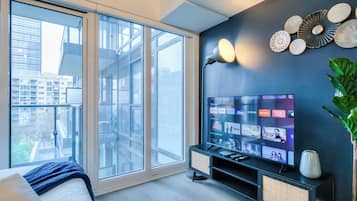 Economy Studio Suite, 1 Queen Bed with Sofa bed, Non Smoking, City View | Living area | 50-inch flat-screen TV with digital channels