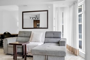 Comfort Suite, 1 Bedroom, Non Smoking, Air conditioning | Living area | 50-inch flat-screen TV with digital channels - Fillmore Downtown Suites (Toronto)