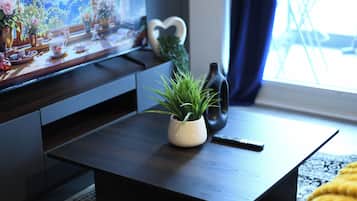 Standard Suite, 1 Bedroom, Non Smoking | Living area | 50-inch flat-screen TV with digital channels