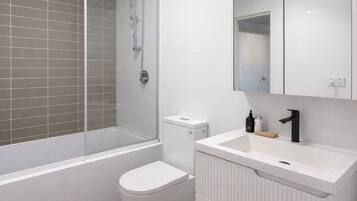 Jetted bath, hair dryer, bidet, towels