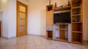 Apartamento conforto, 2 quartos | Sala de estar
