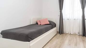 Departamento Deluxe, 3 habitaciones | 5 habitaciones y espacio para trabajar con laptop