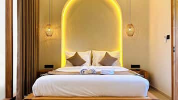 Premium bedding, minibar, blackout curtains, iron/ironing board
