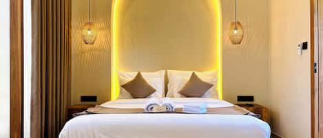 Premium bedding, minibar, blackout drapes, iron/ironing board