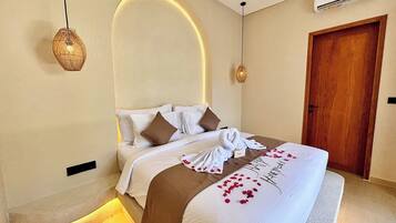 Premium bedding, minibar, blackout curtains, iron/ironing board