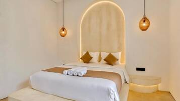 Premium bedding, minibar, blackout drapes, iron/ironing board