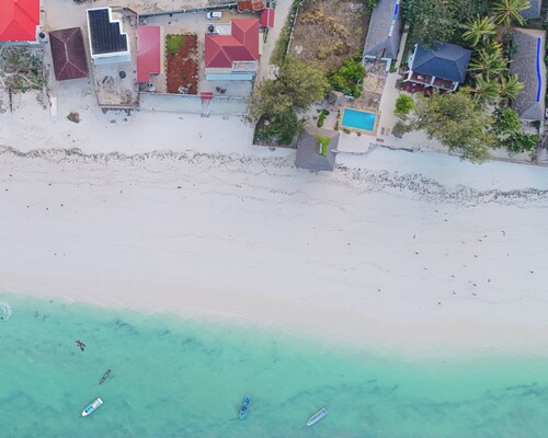 Serene Beachfront Bungalow Escape in Uroa, Zanzibar