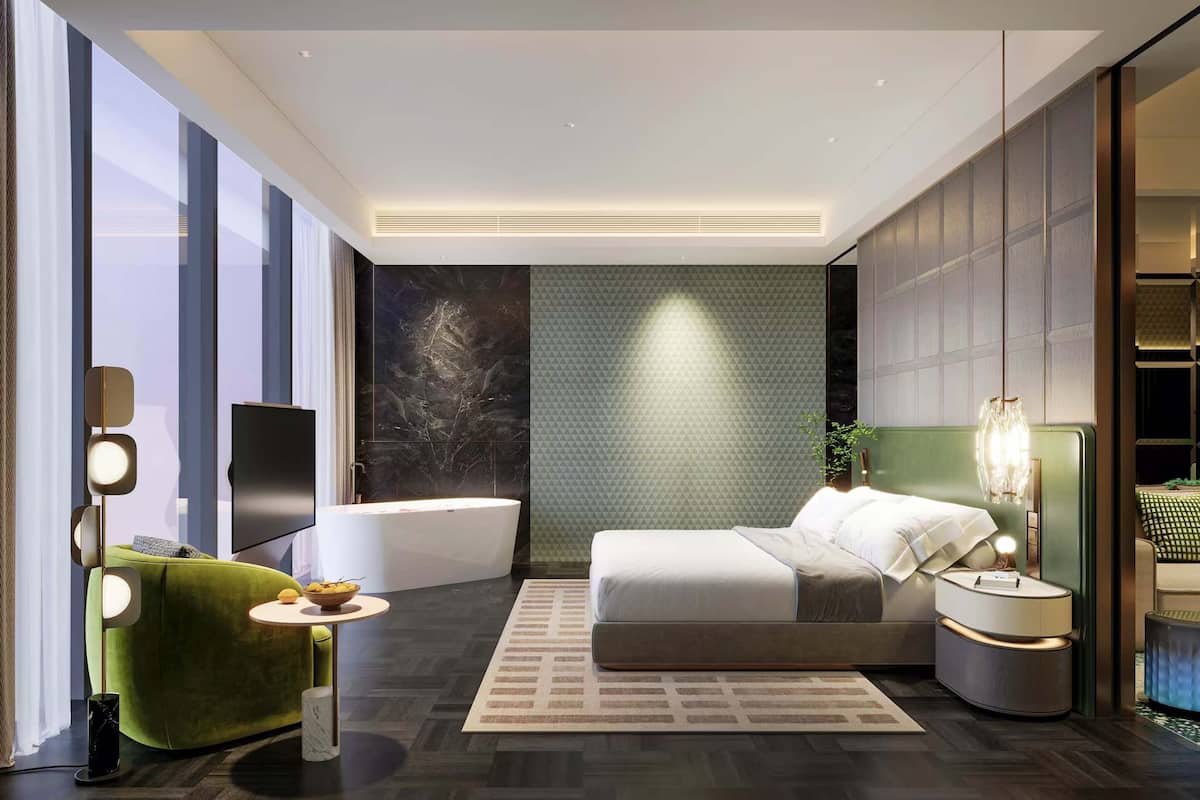Deluxe Double Room, 1 King Bed, River View | Free minibar, in-room safe, desk, laptop workspace