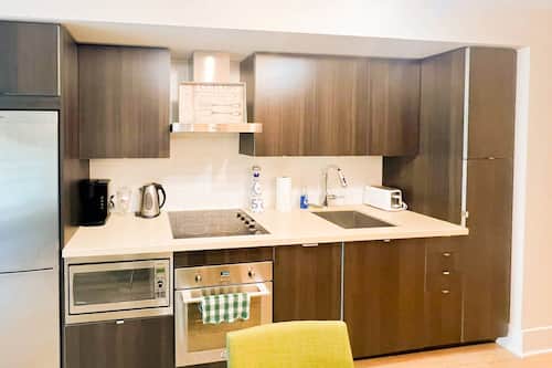 Signature Suite, 1 Queen Bed, Non Smoking, Private Bathroom | Private kitchen | Fridge, microwave, oven, stovetop