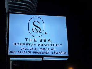 A sign for 'The Sea Homestay Phan Thiet' with contact information. - The Sea Homestay Phan Thiet (Phan Thiet)