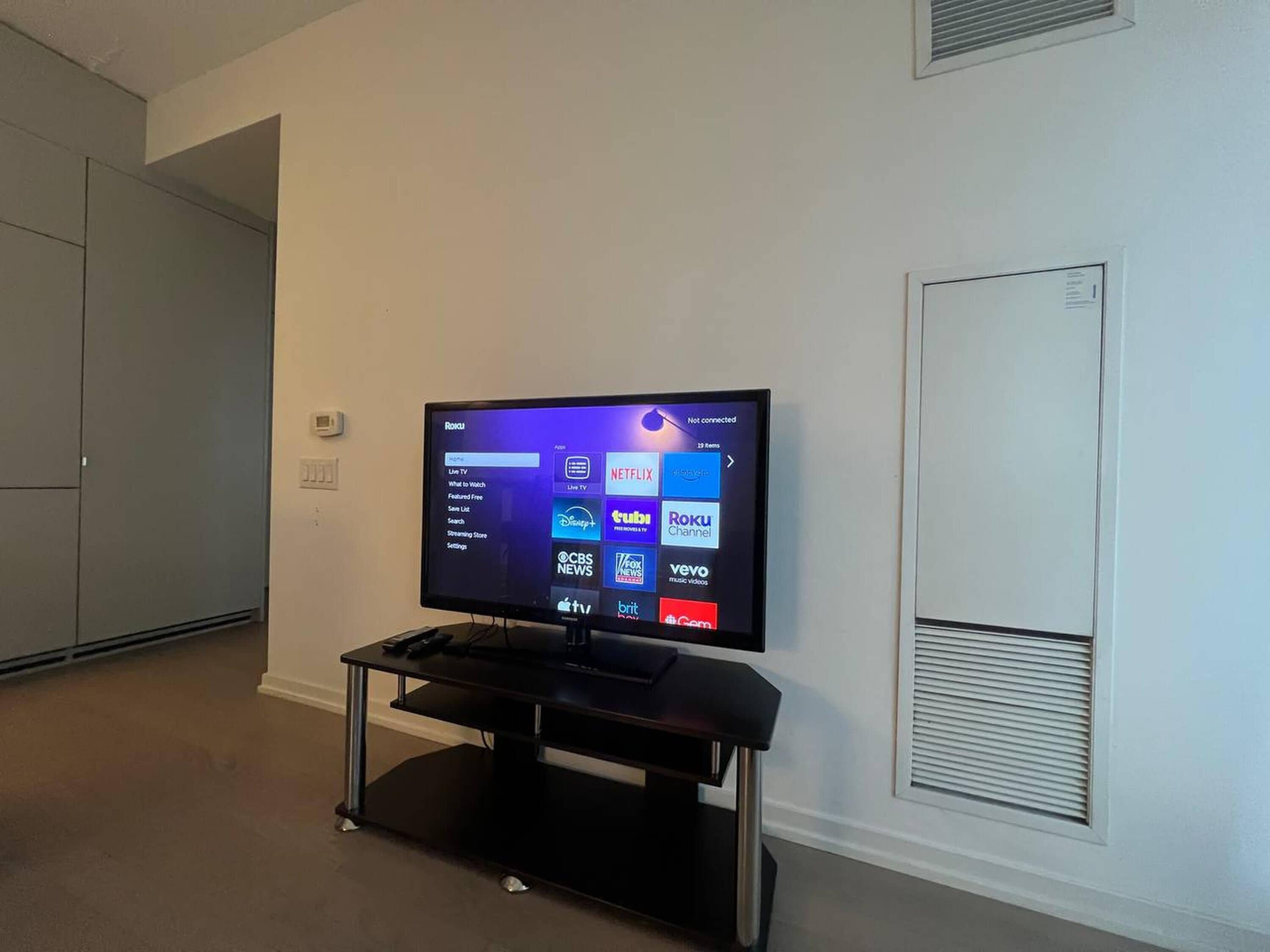 Deluxe Suite, 1 Queen Bed with Sofa bed | Living area | 55-inch TV with digital channels