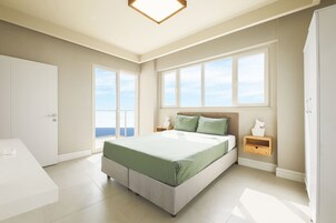 Deluxe Suite, Balcony, Sea View | Premium bedding, desk, blackout drapes, free WiFi