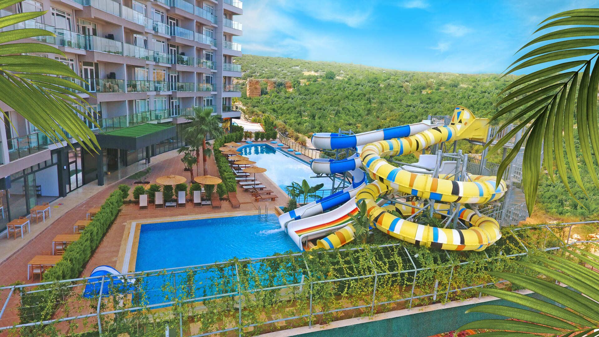 2 indoor pools, seasonal outdoor pool, pool umbrellas, sun loungers