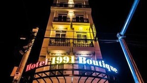 A building with a sign reading 'Hotel 1991 Boutique.' - 1991 Boutique Hotel Phan Thiet (Phu Thuy)