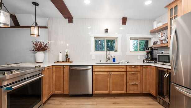 Coffee/tea maker, fridge, oven, stovetop - Spread out across three levels, this cozy A-frame offers space for everyone to unwind—from the open main living area to the upstairs lounge and playful loft. A great fit for families or small groups looking for comfort and a little fun. (Shaver Lake)