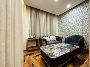 Rom – deluxe | Oppholdsområde