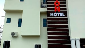 A building with a sign reading 'Motion Hotel.'
