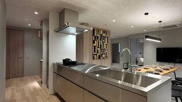 Appartement Design | Cuisine privée | Réfrigérateur, four à micro-ondes, surface de cuisson