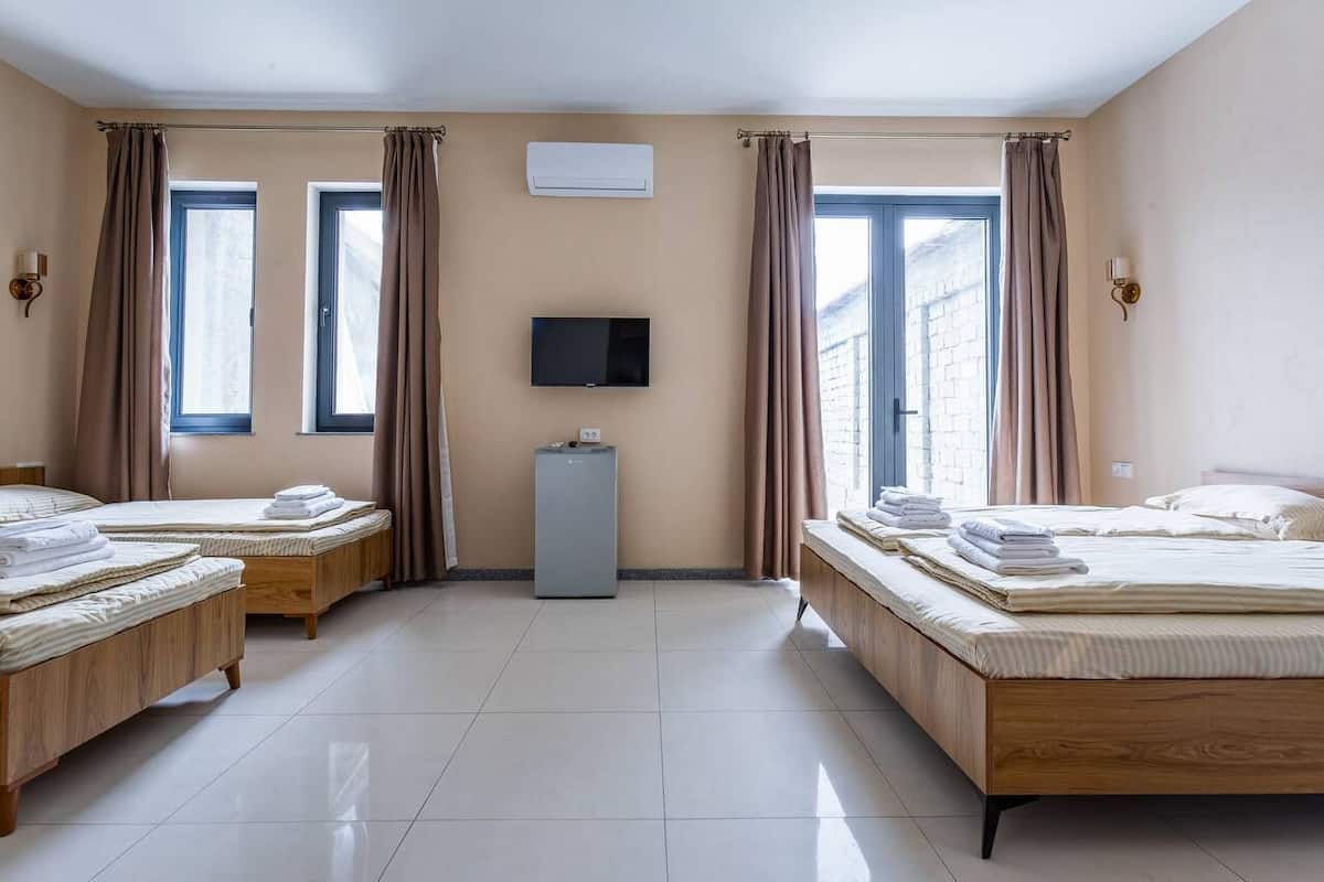 Iron/ironing board (on request), WiFi (free), bed sheets