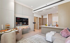Luxury Apartment, City View | Living area | 55-inch Smart TV with digital channels, Netflix, streaming services - 1BR Spa Suite With Private Jacuzzi (Dubai)