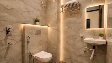 Luxury Room | Bathroom | Shower, free toiletries, towels, soap