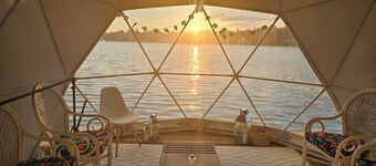 Luxe waterfront cottage with a private dome