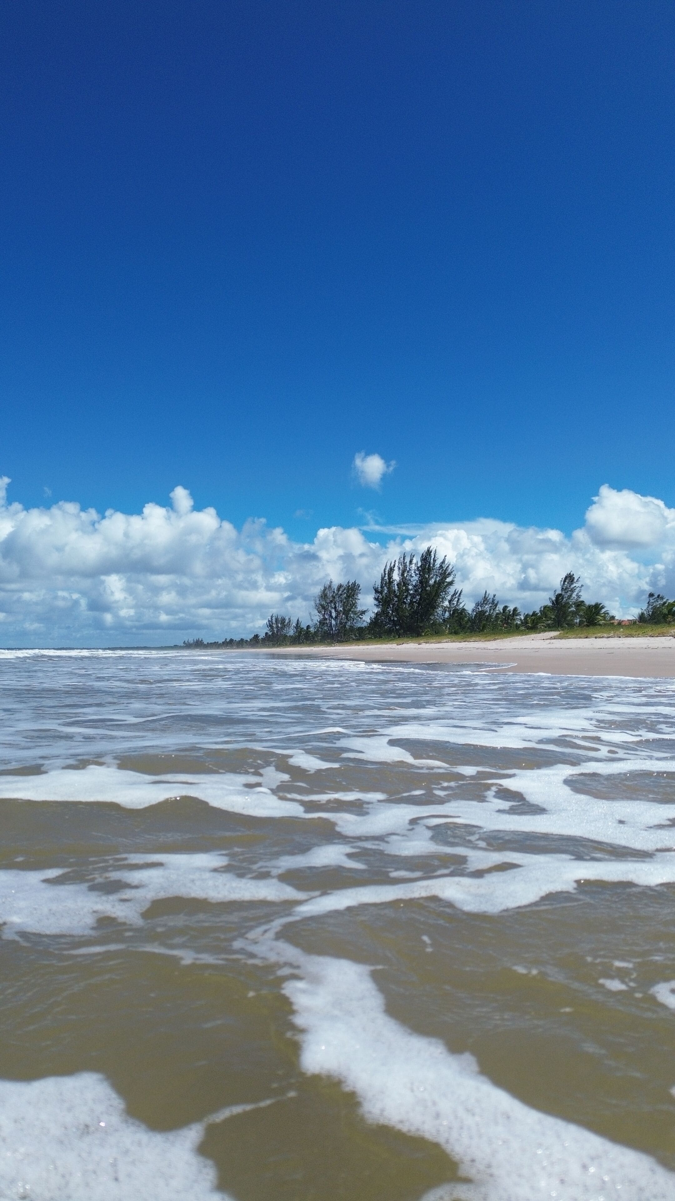 On the beach, white sand