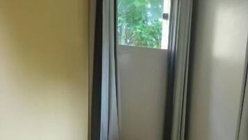 Basic Quadruple Room | Minibar, free WiFi, bed sheets