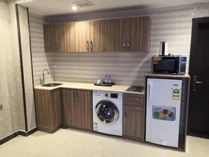 Comfort Apartment, Patio | Private kitchen - Ziyara for Serviced Apartments (Riyadh)